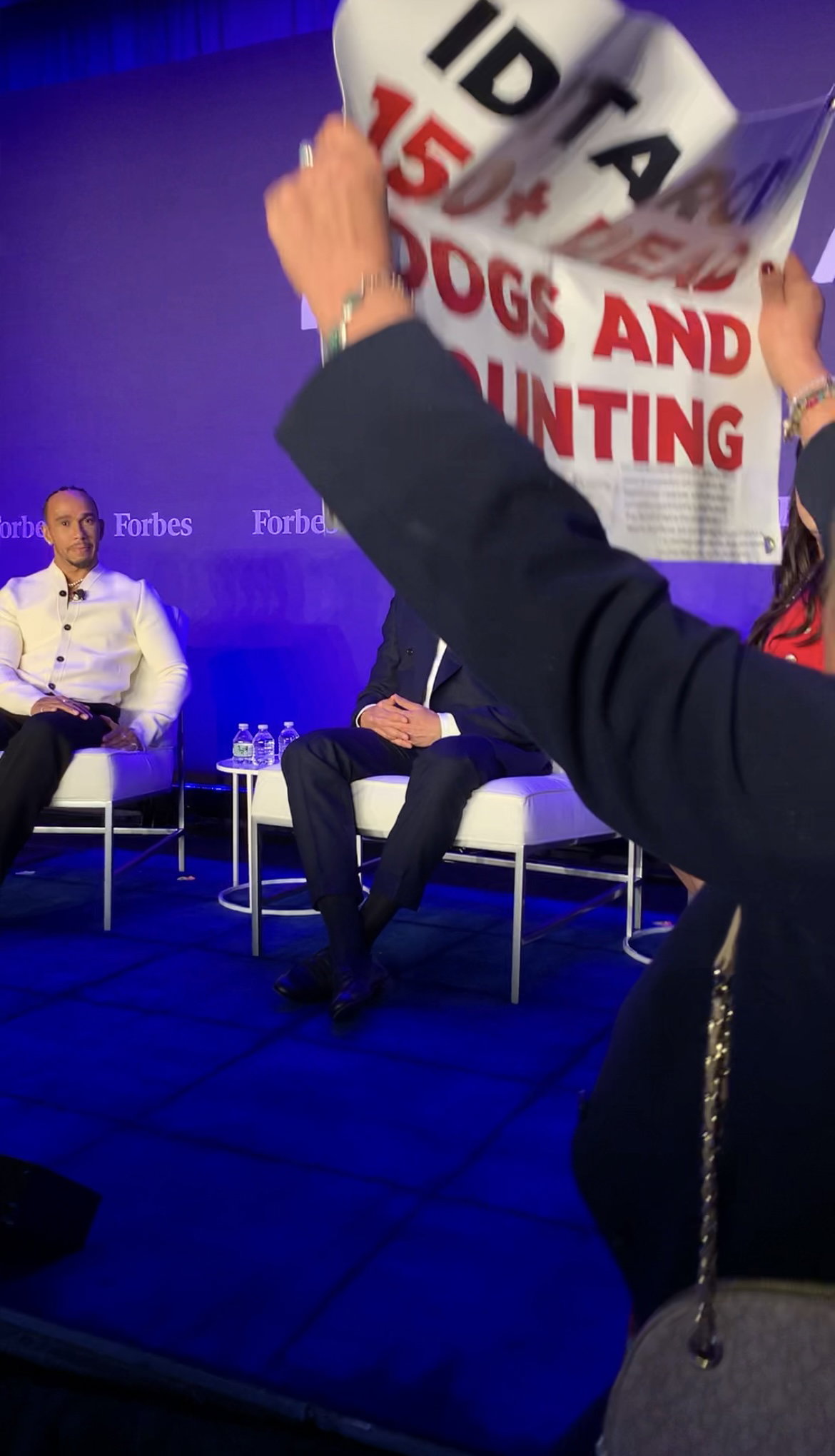 Lewis Hamilton and Toto Wolff confronted by PETA supporters over Alaskan Iditarod dog race